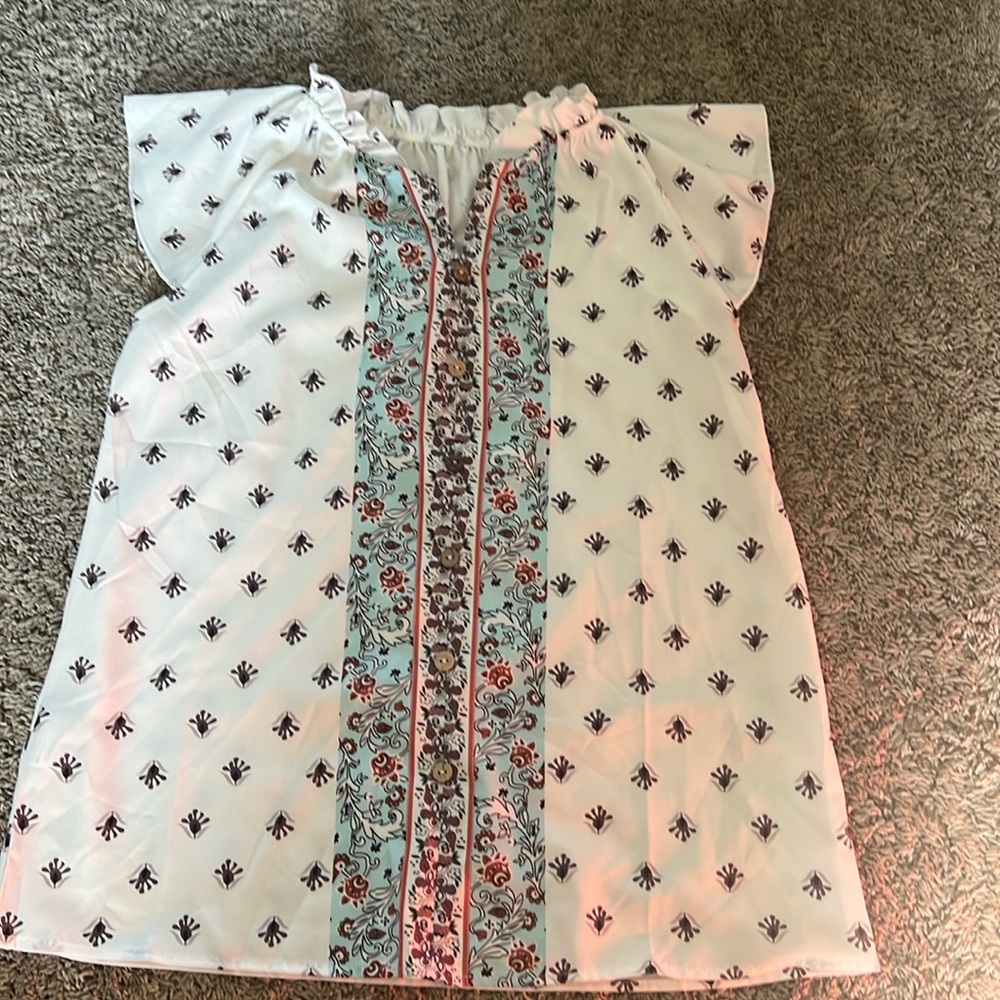 White blouse with blue, orange and brown designs